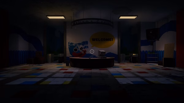 Screenshot from Poppy Playtime showing a dimly lit room with a "Welcome!" sign, colorful floor tiles, and a desk in the center.