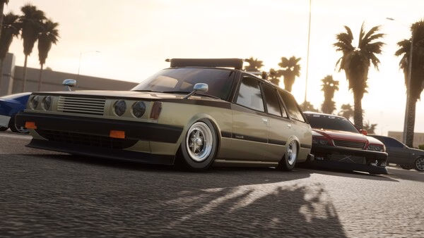 A CarX Drift Racing Online screenshot of two modified cars drifting on a sunlit street with palm trees in the background.
