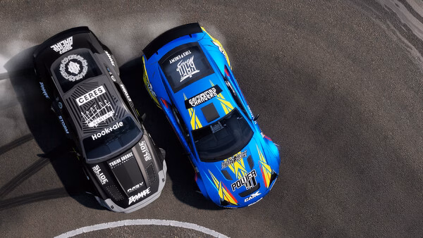 A screenshot from CarX Drift Racing Online shows two cars drifting side by side on a track, leaving tire marks on the asphalt.