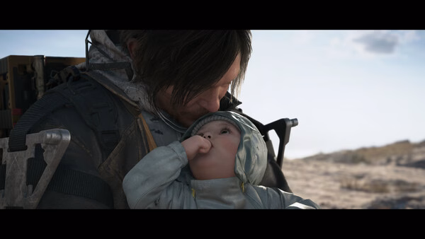 A DEATH STRANDING 2: ON THE BEACH screenshot showing a character holding a baby on a desolate, sandy beach under a bright sky.