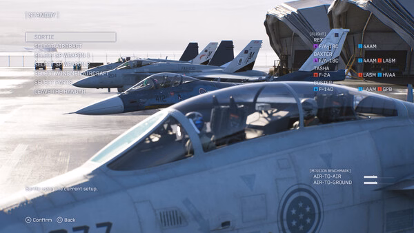 Screenshot from ACE COMBAT 8: WINGS OF THEVE showing fighter jets parked on an aircraft carrier under a clear sky.